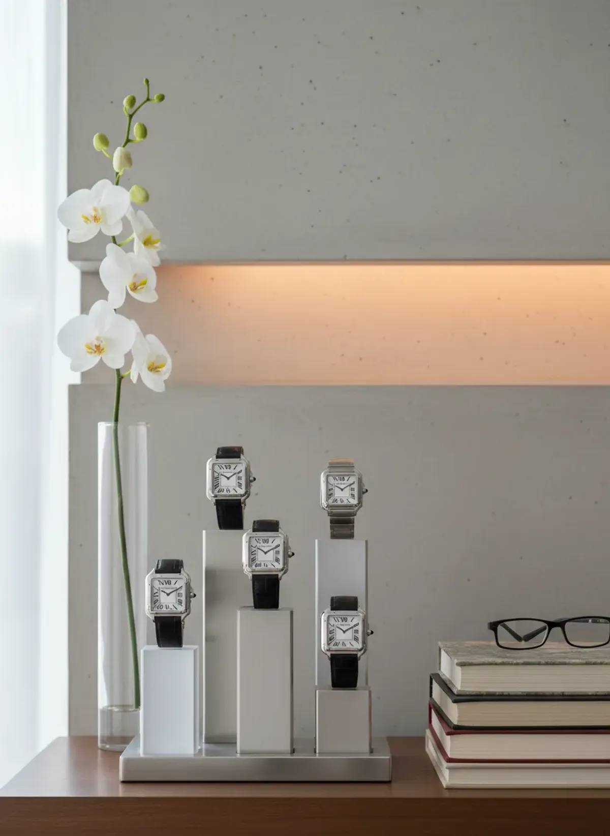 Close up shot of a Cartier Tank Must watch on a leather strap resting on a wooden table